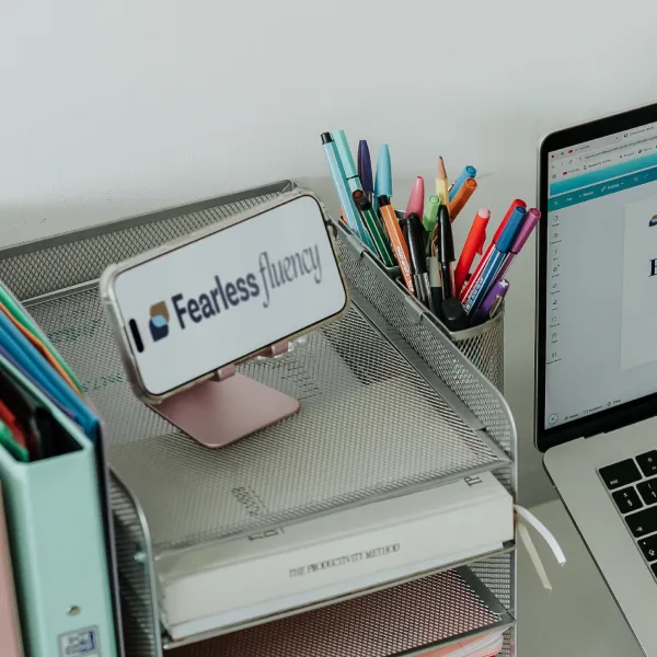 Desk with phone and stationery holder for English Second Language coaching