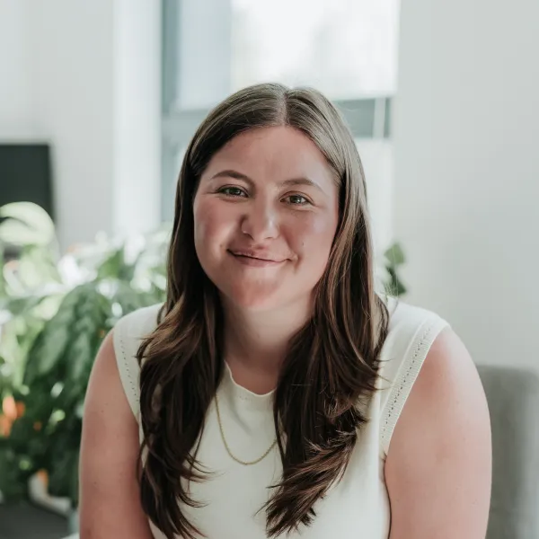 Woman with long hair in room.